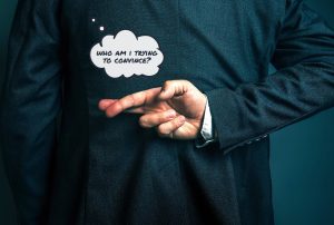 a man crosses his fingers in front of a thought bubble that says who am i trying to convince