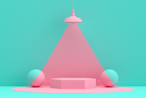 a pink light is shining on a pink podium