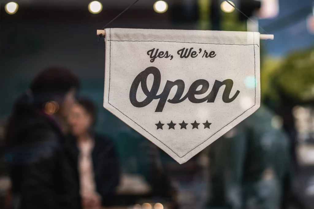 Open sign on the door of a small business
