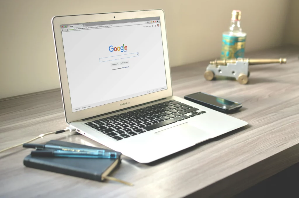 Google search open on laptop on desk
