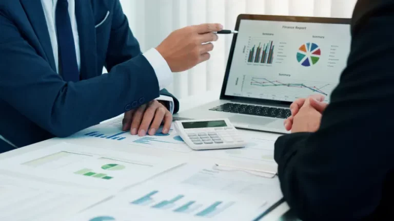 showing a finance report from a laptop