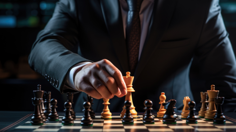 a guy on suit moving a chess piece