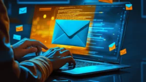 a person using a laptop with a blue envelope on the screen of the laptop